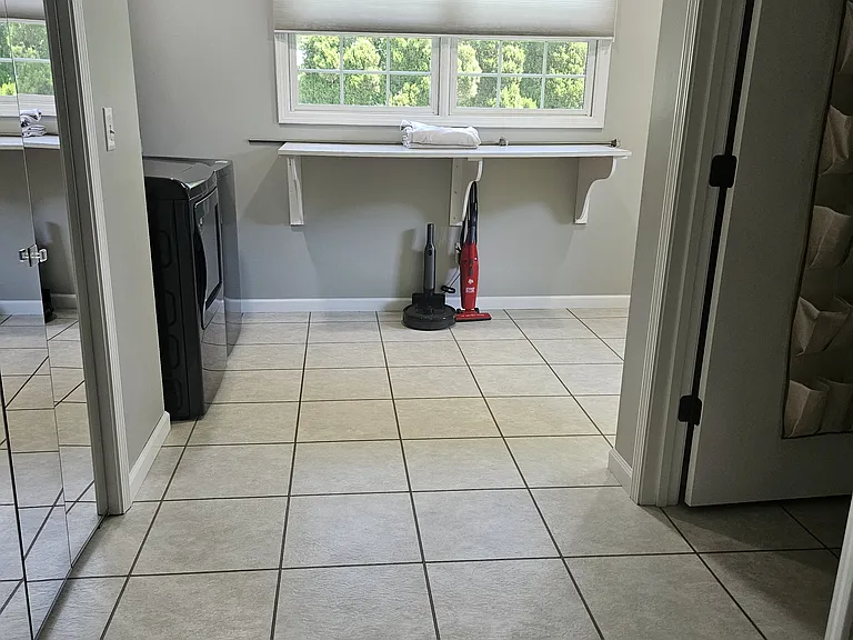 Large walk in laundry room/ mud room off the master bedroom