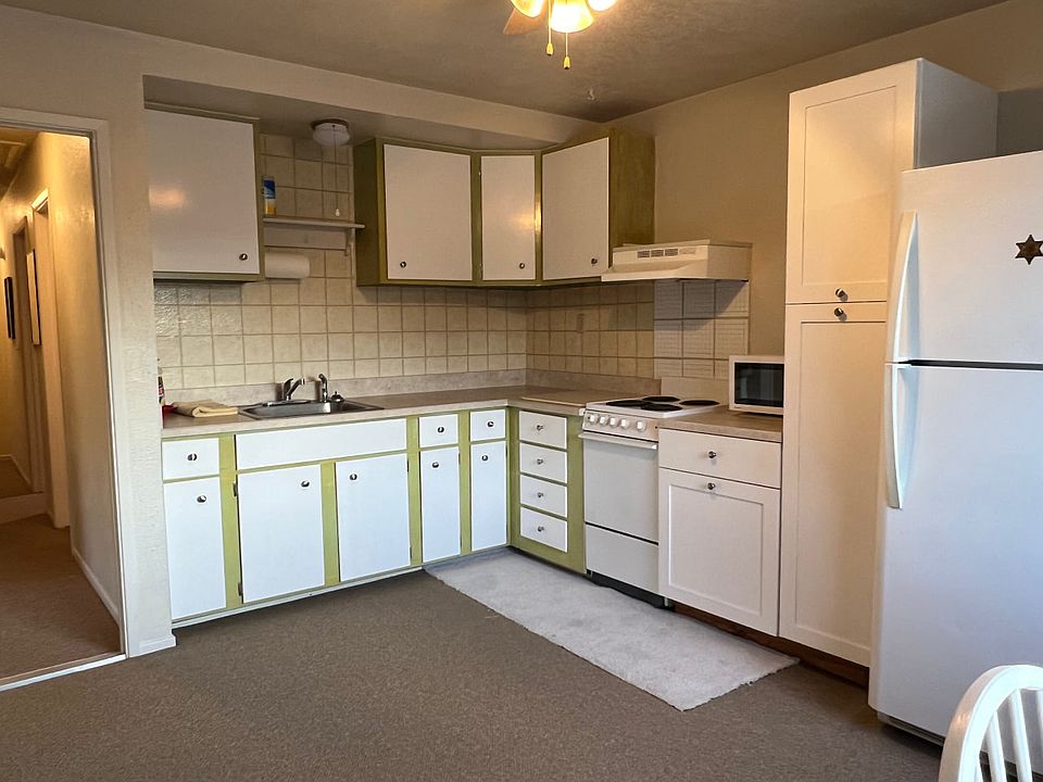 Newly Renovated kitchen with updated cabinets, new appliances, and plenty of counter space. Bright and functional, ideal for everyday cooking.