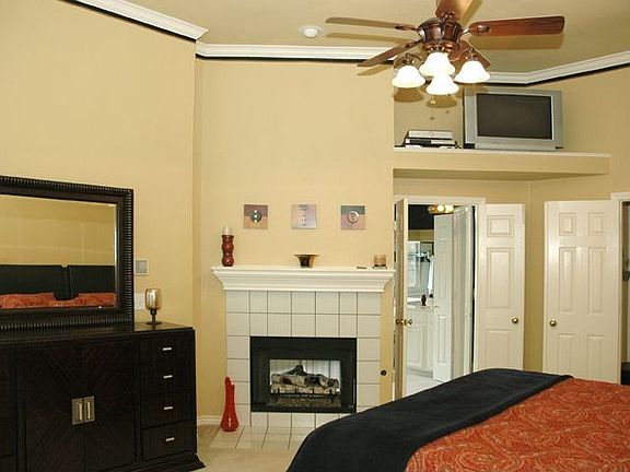 Luxury Master with See Through Fireplace to Master Bath