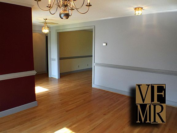 Dining area to foyer and living room beyond