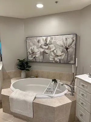 Master bath has large soaking tub