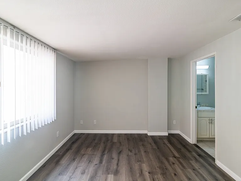 Rear ensuite bedroom & entry to bathroom