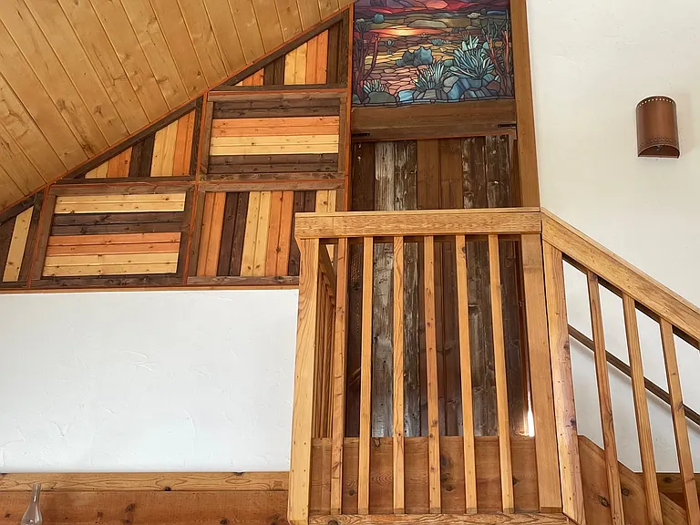 Sliding door leads to the upstairs master bedroom.