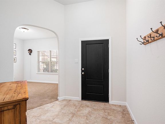 The pictures were taken while the home was occupied. None of the furniture is included with the home.