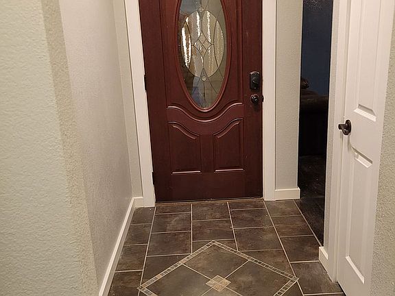 tiled entry, beveled glass d