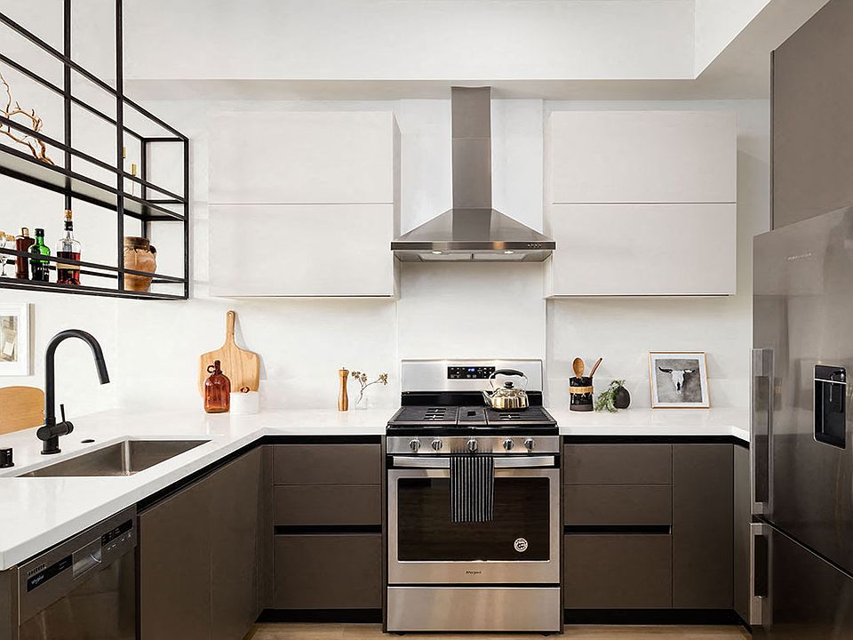 Spacious kitchens with Quartz countertops and stainless steal appliances