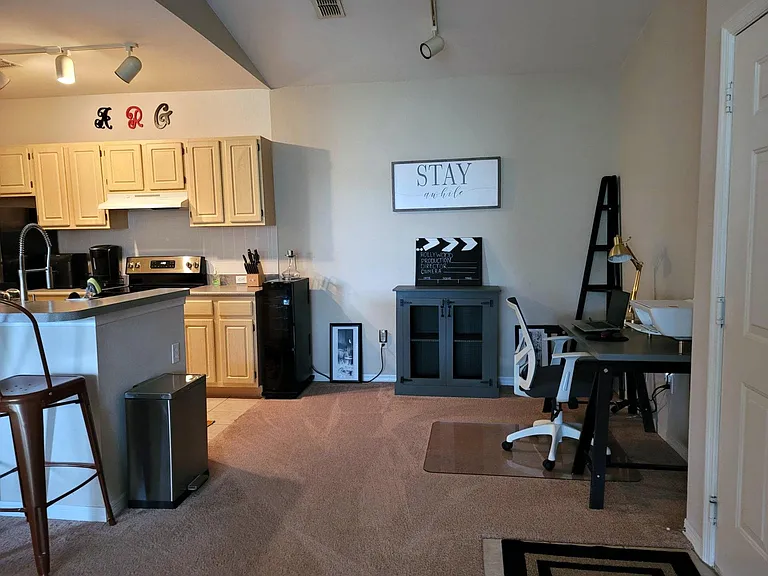 Dining area off the kitchen with desk chair & cadenza