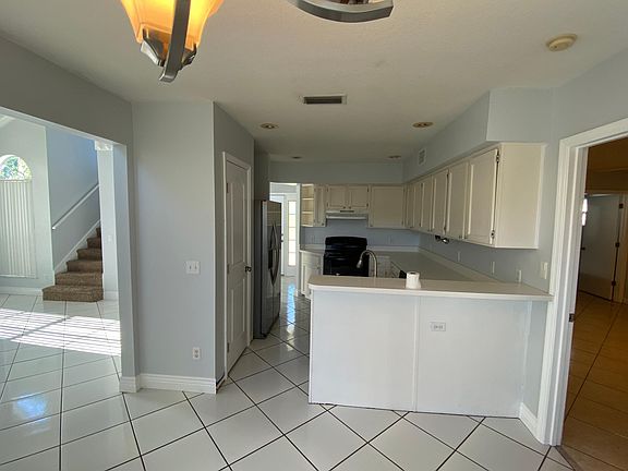 dining area looking into kitchen. Living room left. Master to right.