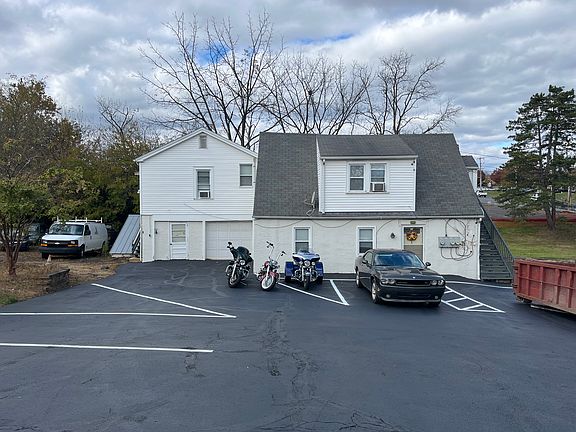 Apartment is on far Left up private staircase.