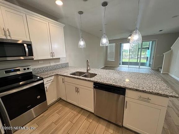Kitchen with stainless steel appliances