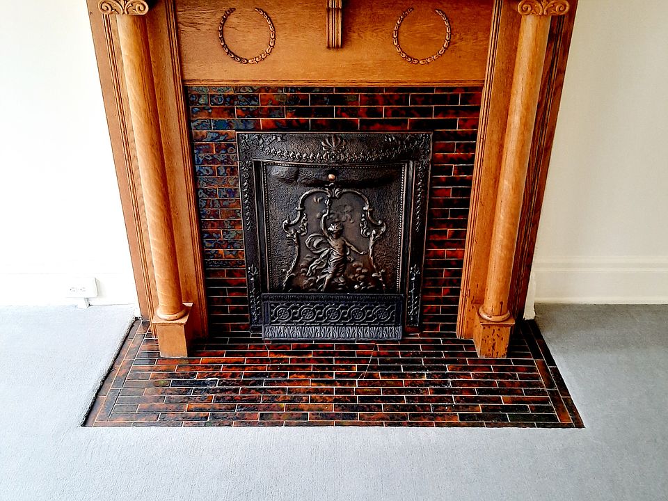 This room with a bay window would make a perfect office or a guest room. The fireplace is typical of the quality of The Aurora's materials and craftmanship.