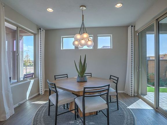 Cafe on the Ocotillo home design includes a sliding glass door to access the patio and yard.