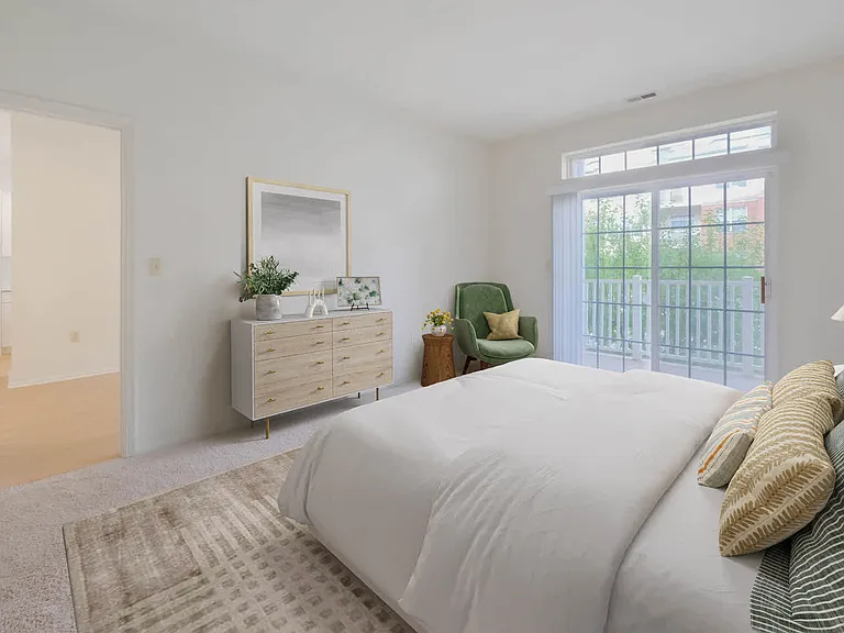 Carpeted Bedroom with Balcony