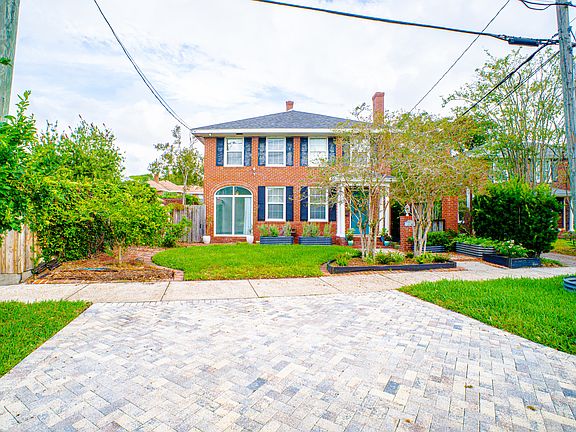Exterior of 1215 Landon showing paver 2-car off-street parking in front of house