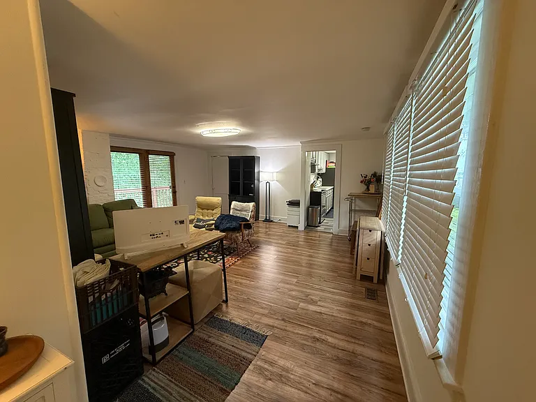 Furnished view of living area from main door