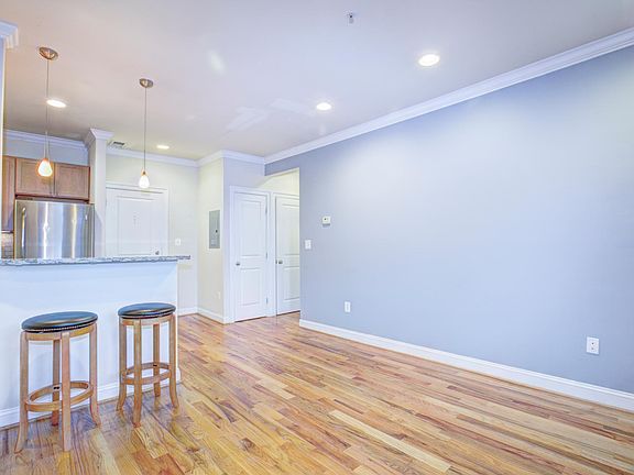 View from Living Room to Kitchen and Entryway