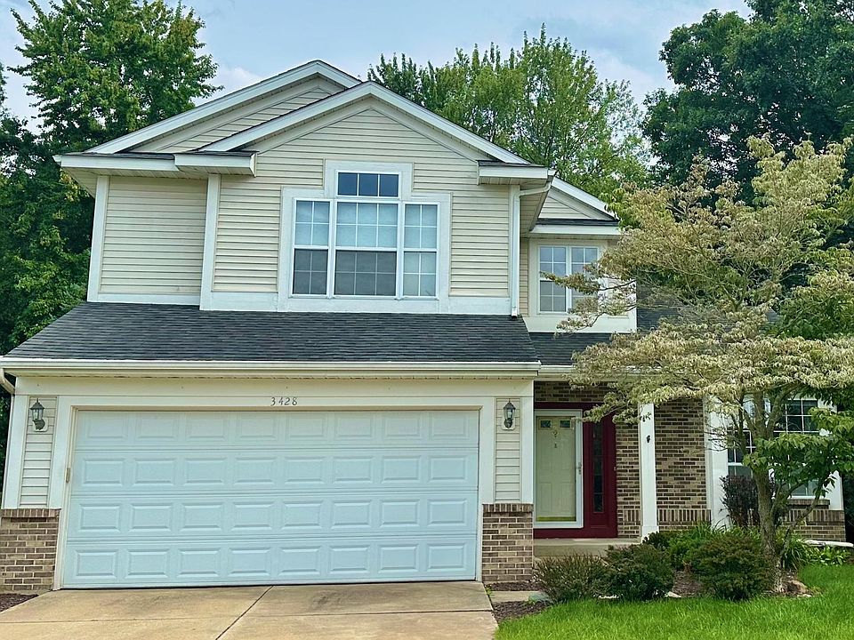 A beautiful home on almost an acre of lawn with a wooded backyard!