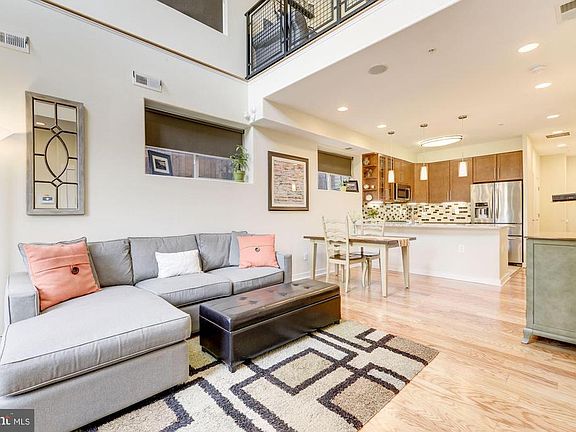 Living Room with Soaring ~20+ Foot Ceiling!