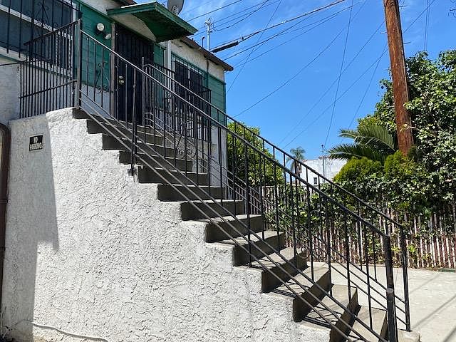 Front view of apartment, above the garage.