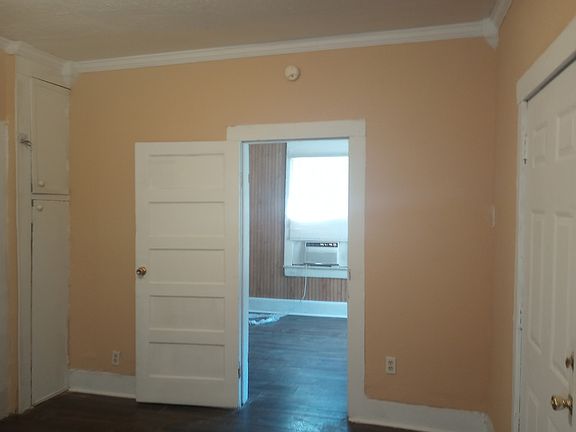 Living room to front bedroom