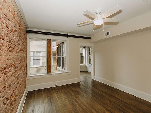 Primary bedroom opens to sunroom