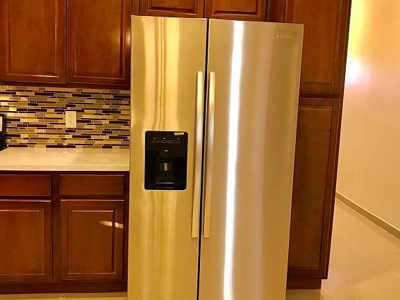 NEW AMANA DOUBLE DOOR FRIG