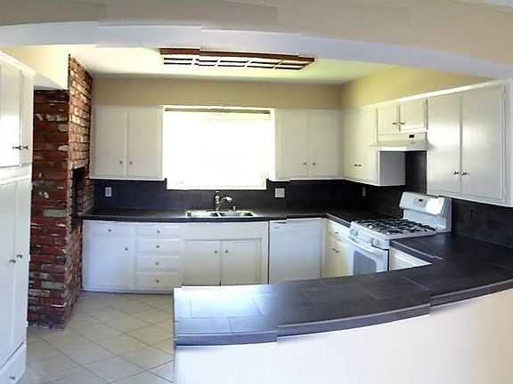 Kitchen - including built in gas BBQ, dishwasher
