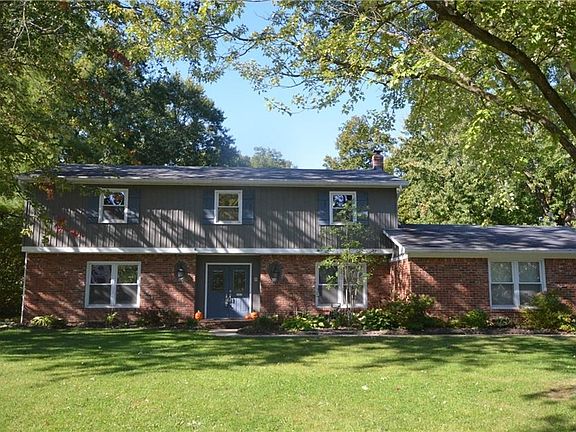 Note the large mature trees in the front yard.  Current owners have had all landscaping next to the house professionally redone.