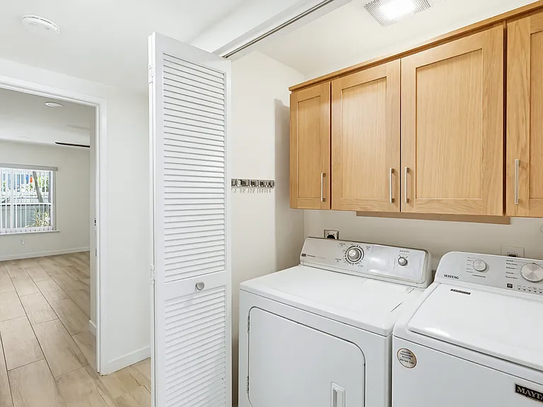 Full size washer & dryer in hallway