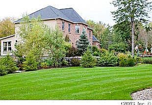 Front Exterior w/ beautiful landscaping surrounding