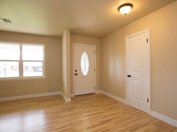New front door and all new interior doors with oil bronze hardware.