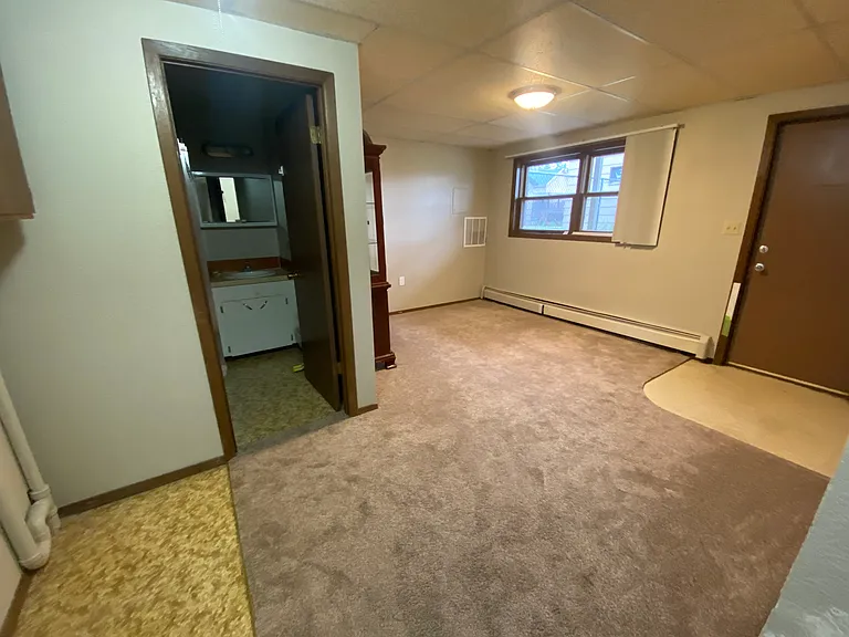 Laundry area and second living room