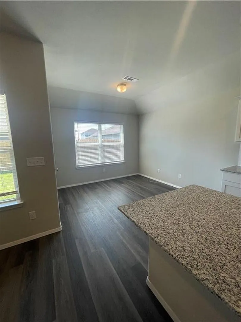 Stylish 3-Bedroom Home with Open Layout & Pet-Friendly Fenced Yard — Photo 3