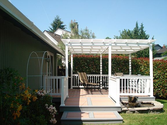 12 x 16 vinyl pergola with composite deck off the master suite 