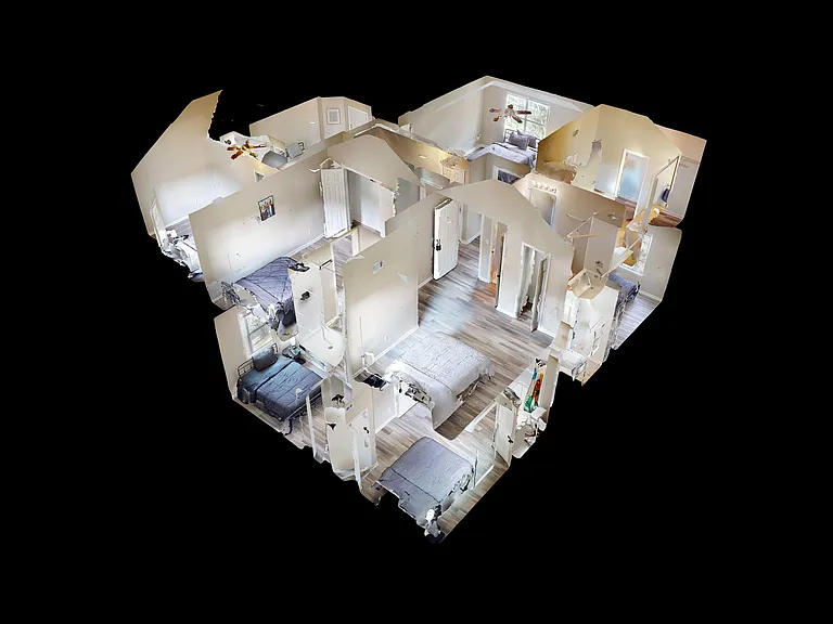 Multi-room layout offers private bedrooms and shared hallways, with wood-style flooring and natural light from multiple windo