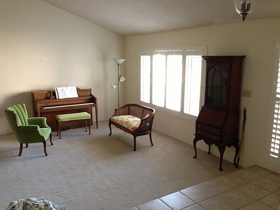 Plantation shutters, tile entryway