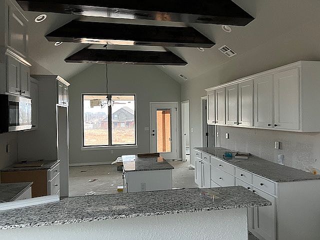 Kitchen facing back yard