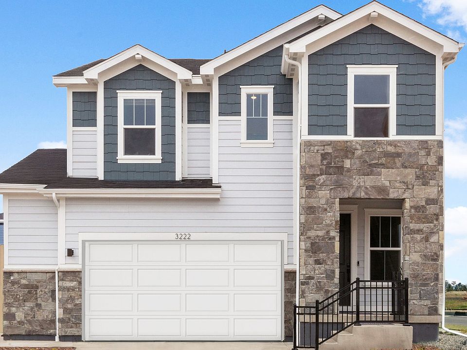 Beautiful two-story home exterior showcasing thoughtful design and curb appeal.