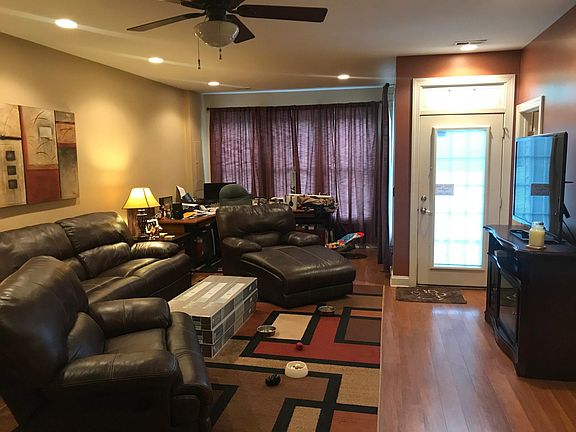 Finished basement with garage and backyard access.