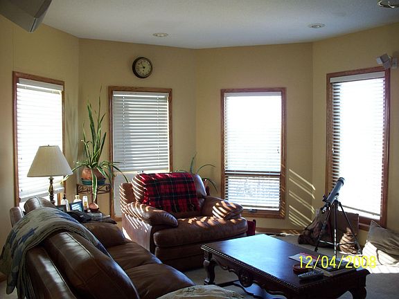 Lots of windows in living room for great view