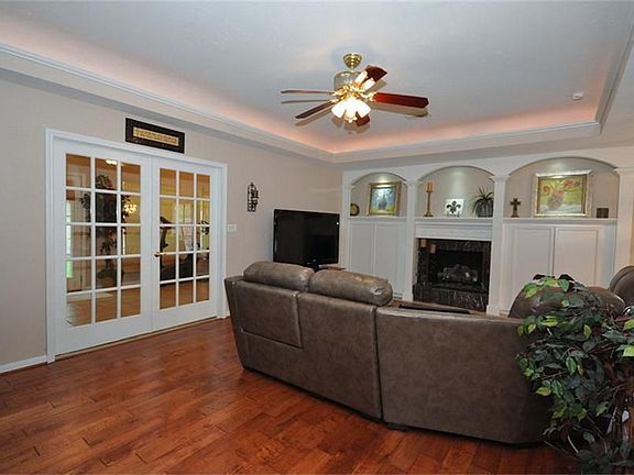 Gorgeous den with hardwood floors!