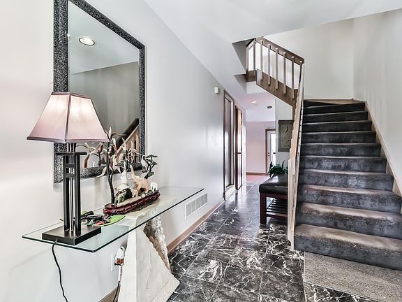 Front entrance foyer with marble tile