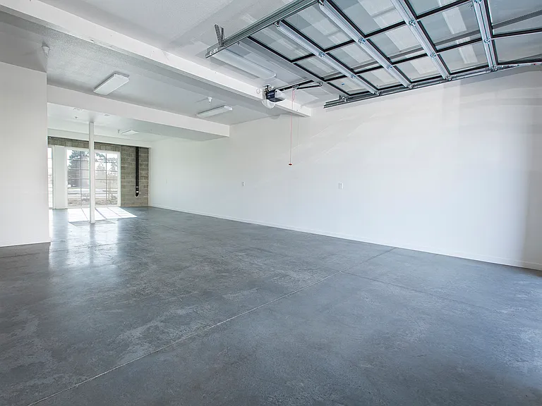 Open space for your business or living needs with garage door roll up