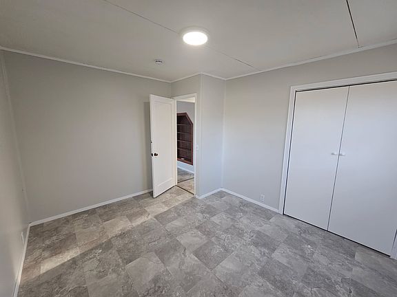 Bedroom 1, from front corner (faces front yard)