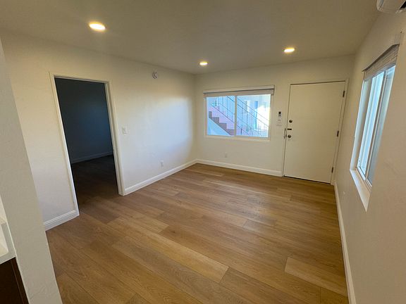 Bright living Room with Brand New Floors