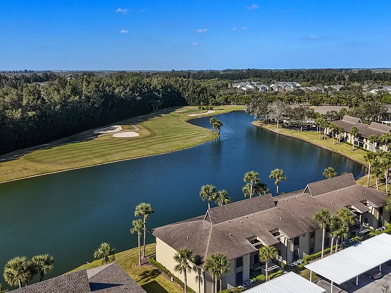 Enjoy STUNNING expansive lake & golf course views!