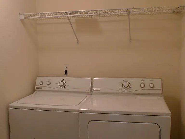 Laundry room w/ washer and dryer hookup only. Washer and dryer left over from previous tenants, maintenance is tenants responsibility!