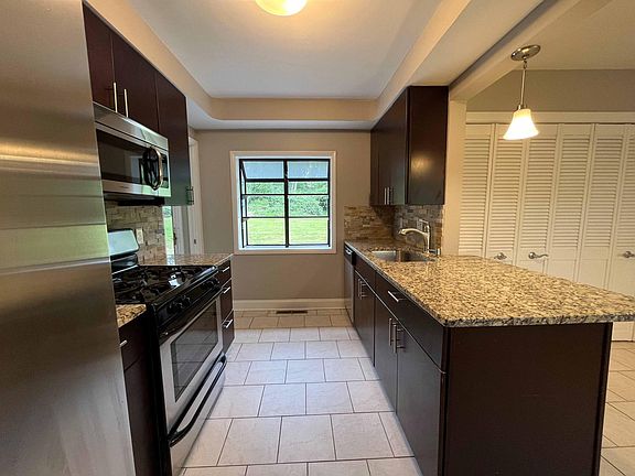 Renovated Kitchen with Stainless Steel Applicances