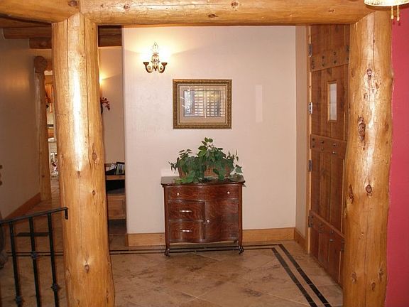 Entry hall view.  10' tounge and groove ceilings throughout home