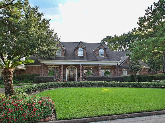 CUSTOM BUILT BY JOHN SLATTERY WITH TWO BEDROOMS DOWN & MAGNIFICENT UPGRADES - When you arrive at this stunning custom home you will immediately notice the remarkable landscaping and magnificent curb appeal. This home is breathtaking and is unparallel